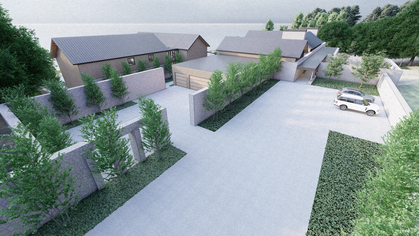 Aerial view of modern home with central courtyard, gabled rooflines, and tree-lined drive in Washington state.