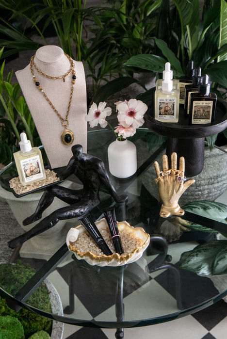 Curated wellness retail display featuring skincare products, jewelry, and accessories inside Skin by Lovely medical spa in Portland.