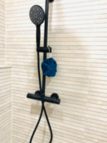 Fleur de douche lavable - Bleu paon