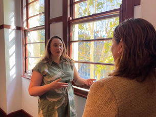 Jade Malanczak talking with a client