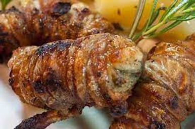 Gnummareddi are made with a mix of lamb or milk-fed kid offal (liver, lung, and kidney) tightly encased in their own intestines.