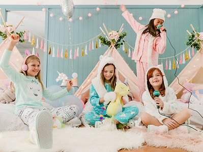 girls enjoying a sleepover teepee party