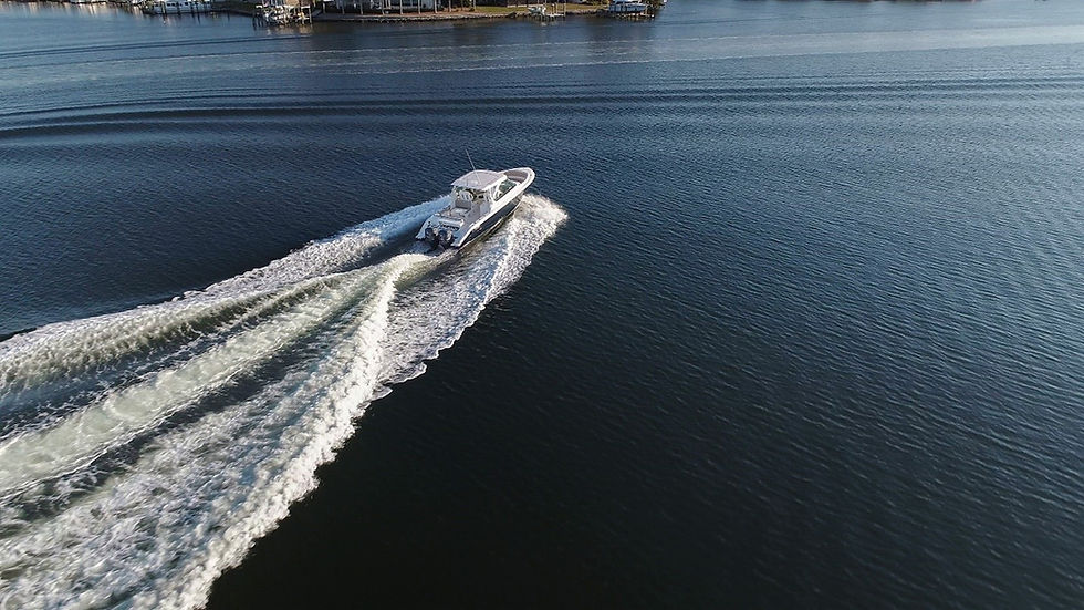 Example photo of yacht on water with zoom lens from Air 3 Drone