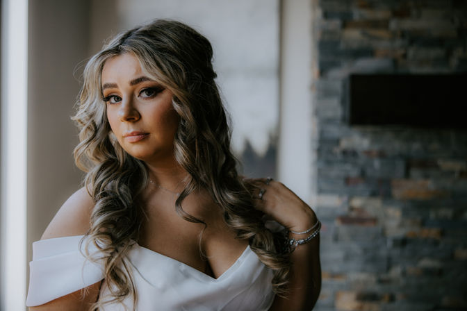 Bride’s polished wedding day look with full glam makeup and glowing, flawless complexion.