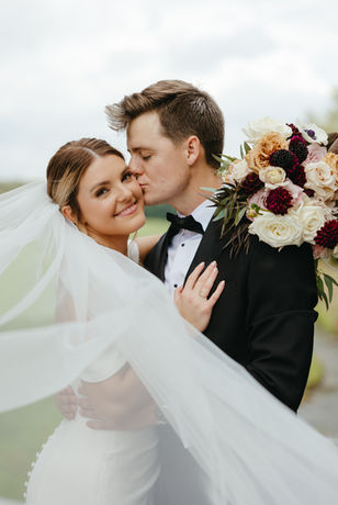 Professional fall bridal makeup with golden bronze eyeshadow and glowing skin for outdoor wedding