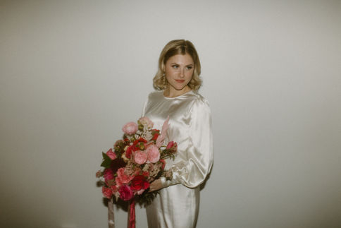 Classic, timeless bridal makeup highlighting delicate features for a sophisticated winter wedding portrait.