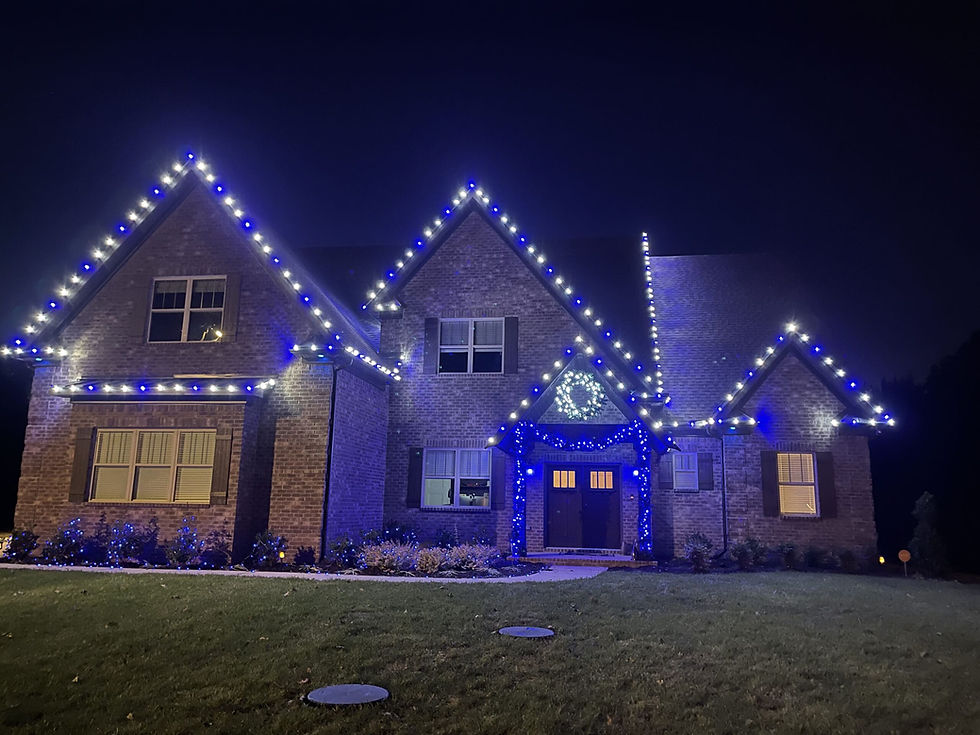 Christmas light installation Huntsville AL on a brick home