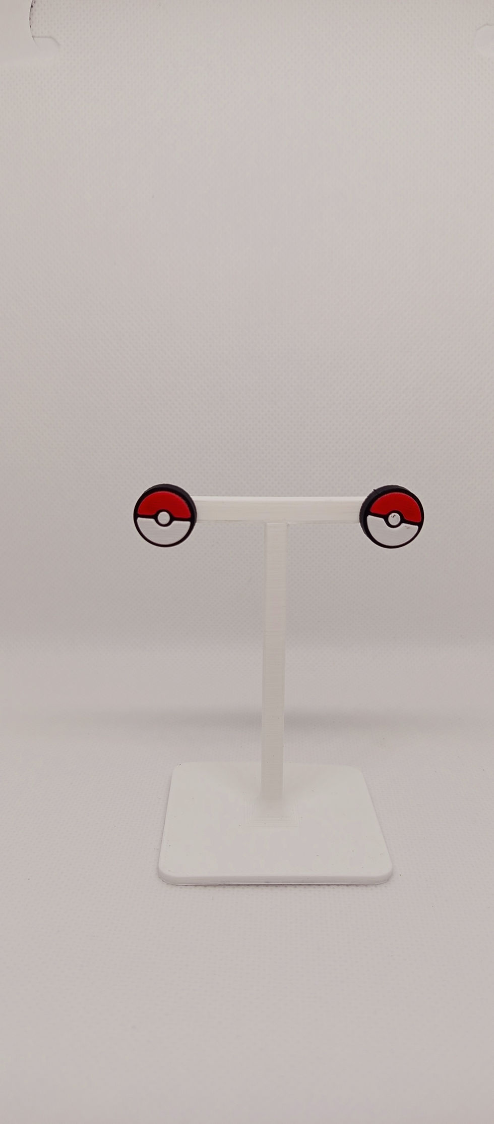 Brincos pequena pokébola 