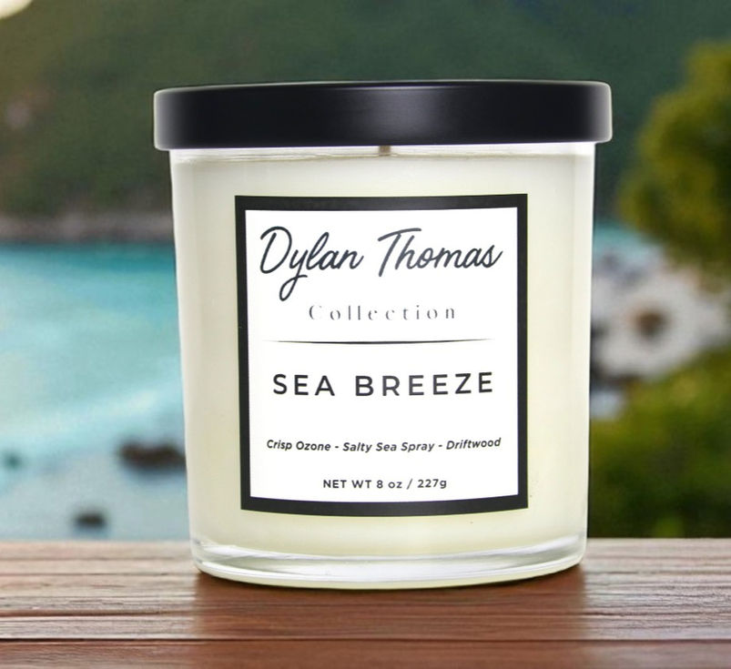Sea Breeze Candle – Dylan Thomas Luxury Collection | Clear glass jar with black lid, coconut apricot wax luxury candle
