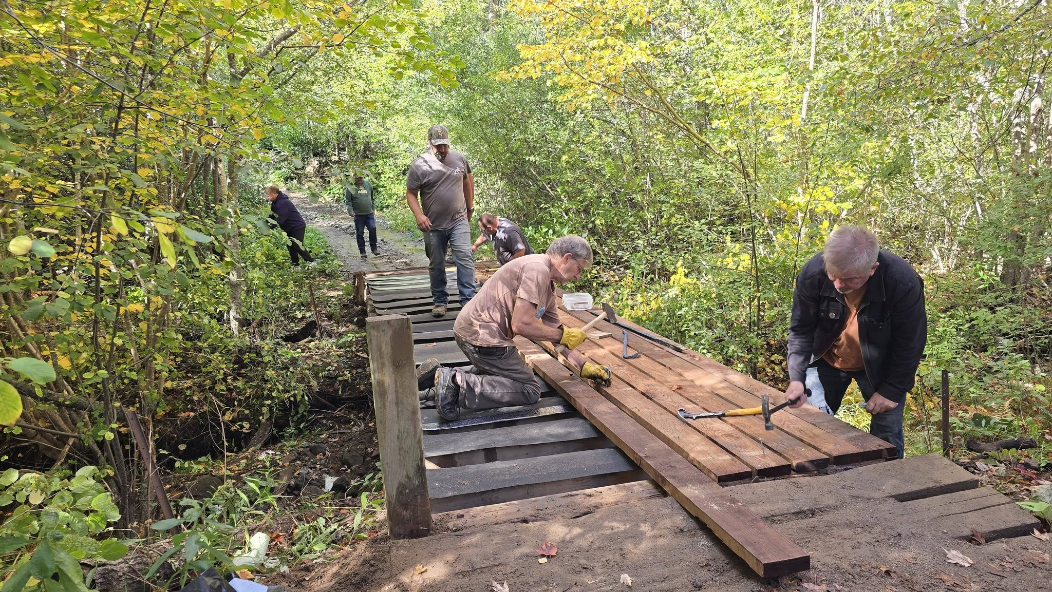 Volunteers working on the Bypass Trail bridge