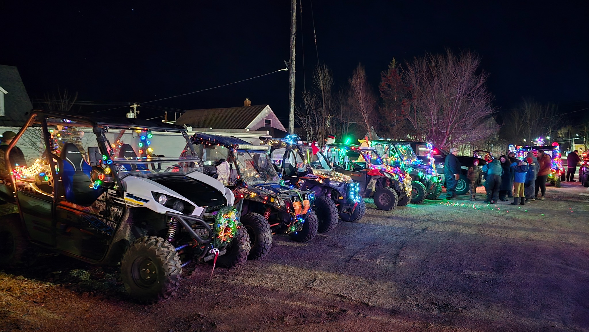 Decorated ATVs and side-by-sides lit up for the Deck the Trails holiday ride