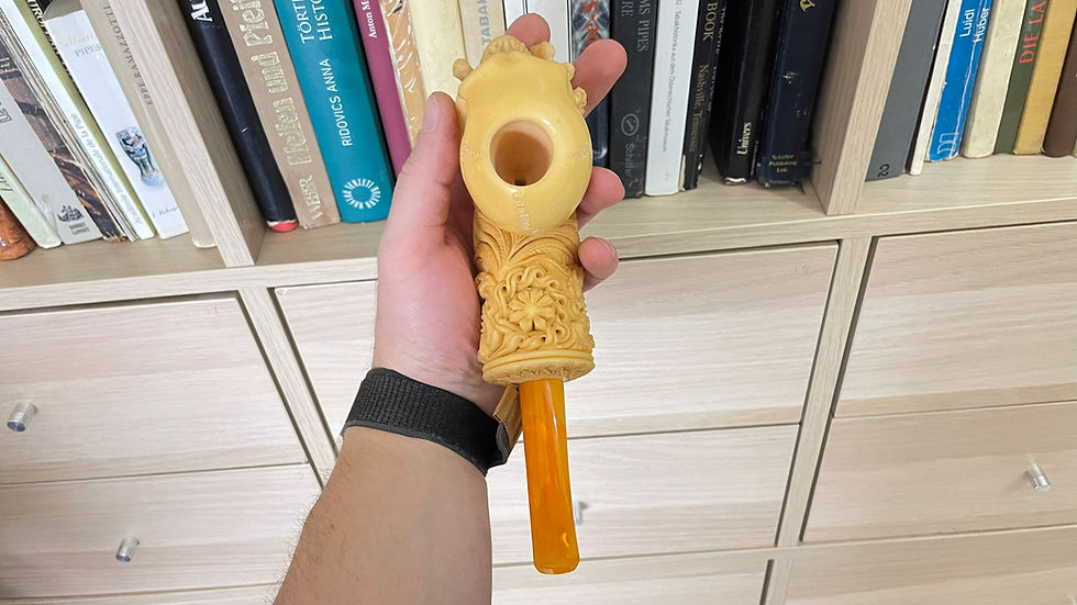 Thumbnail: Bone Hand Holding Skull Smoking Pipe