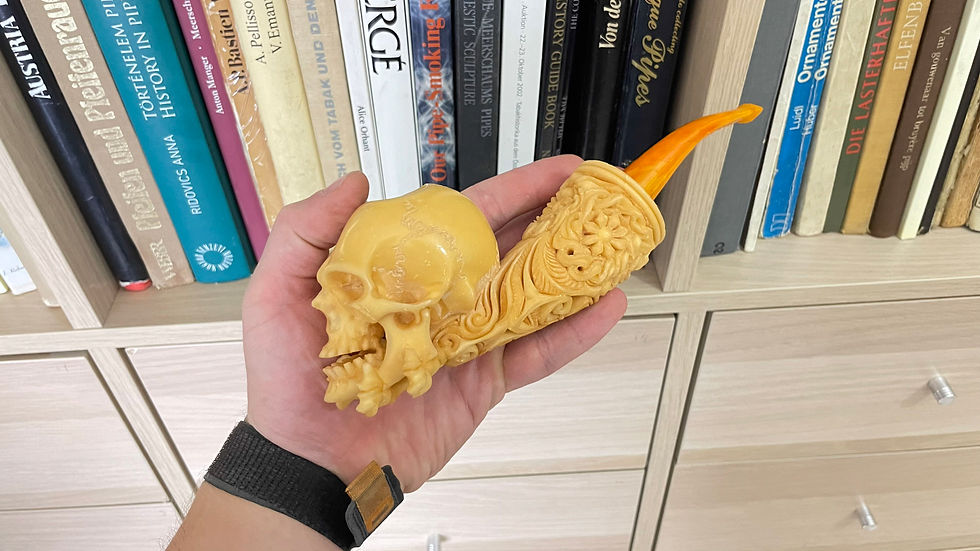 Thumbnail: Bone Hand Holding Skull Smoking Pipe