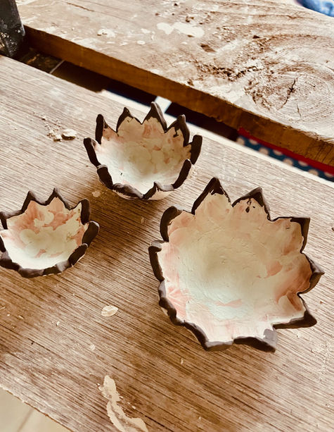 Miniature ceramic petal bowls in progress in the studio