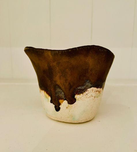 Pinch pot with dripping metallic glazes