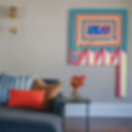 Joey Solomon's painting featured in the family room.