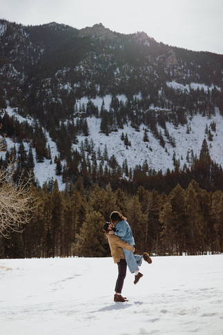 man and woman pose for photo in red lodge montana