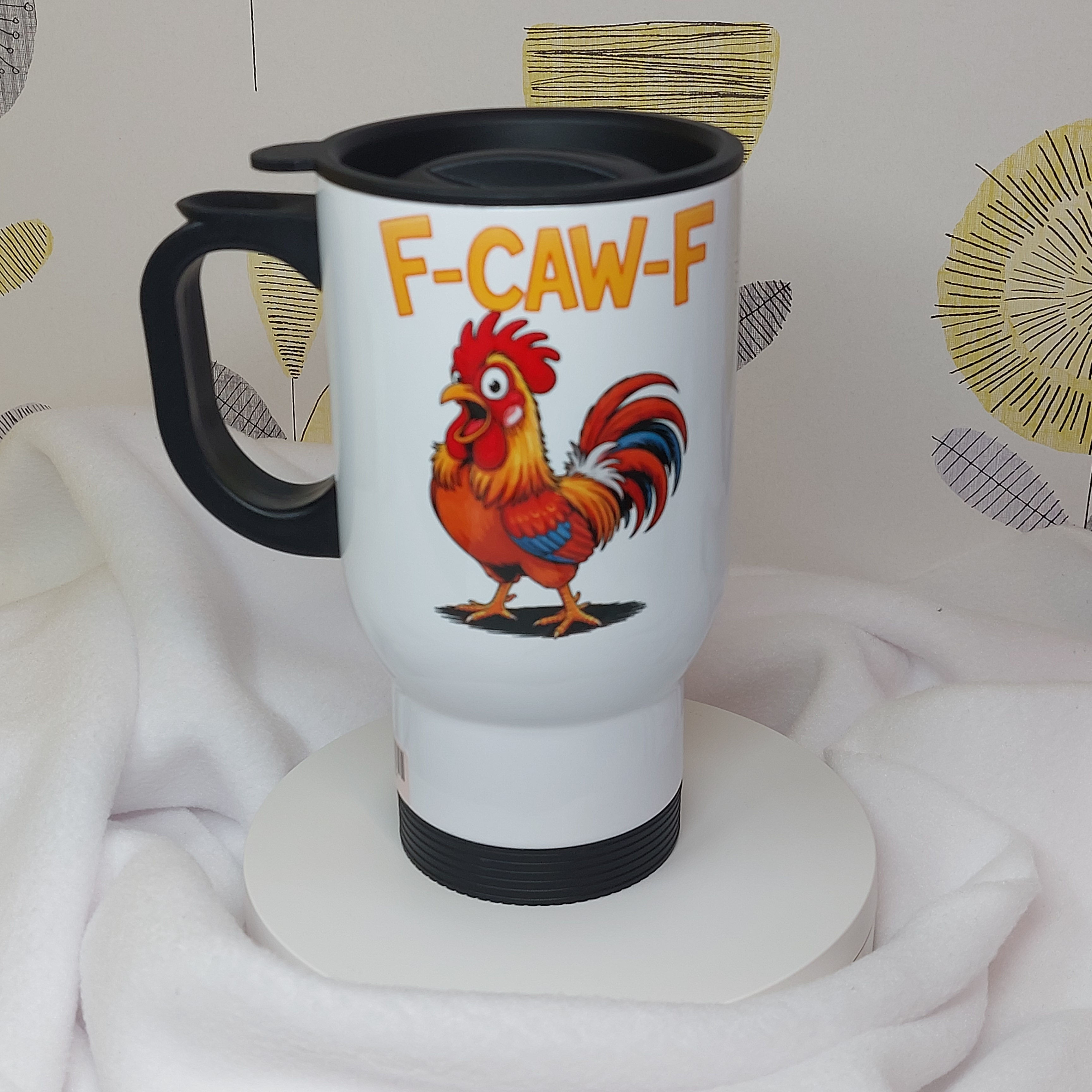 F-CAW-F writing & a colourful Rooster on a white Stainless Steel Travel Mug, black plastic handle & closeable press on lid.