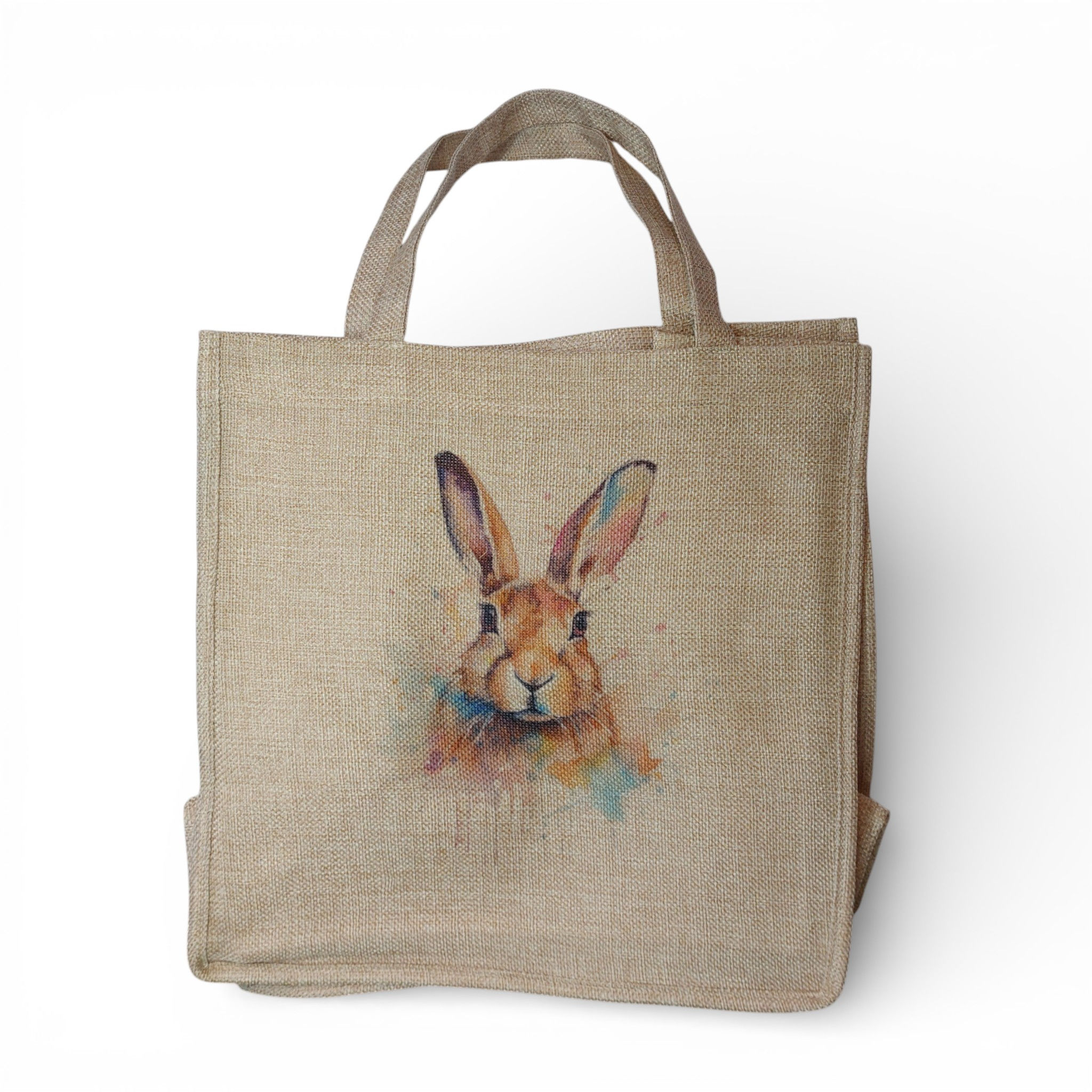 Watercolour image of a Hare with pastel splashes and drips of paint on a burlap bag