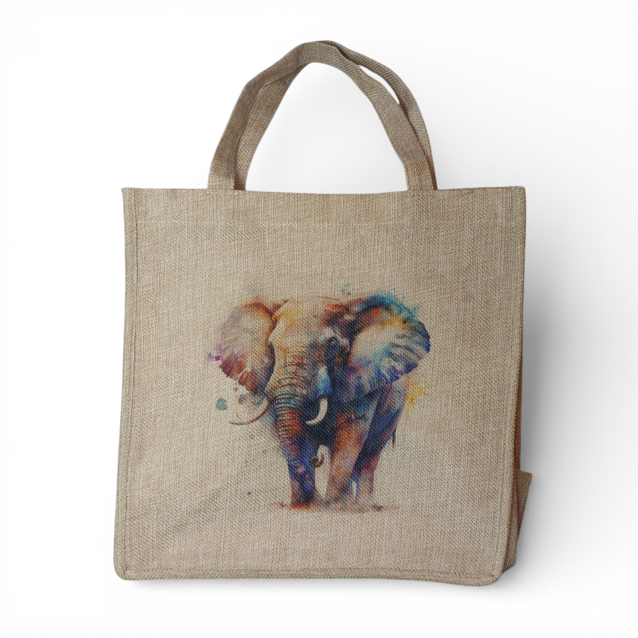 multicoloured watercolour image of an elephant surrounded by splashes and drips of paint on a burlap bag
