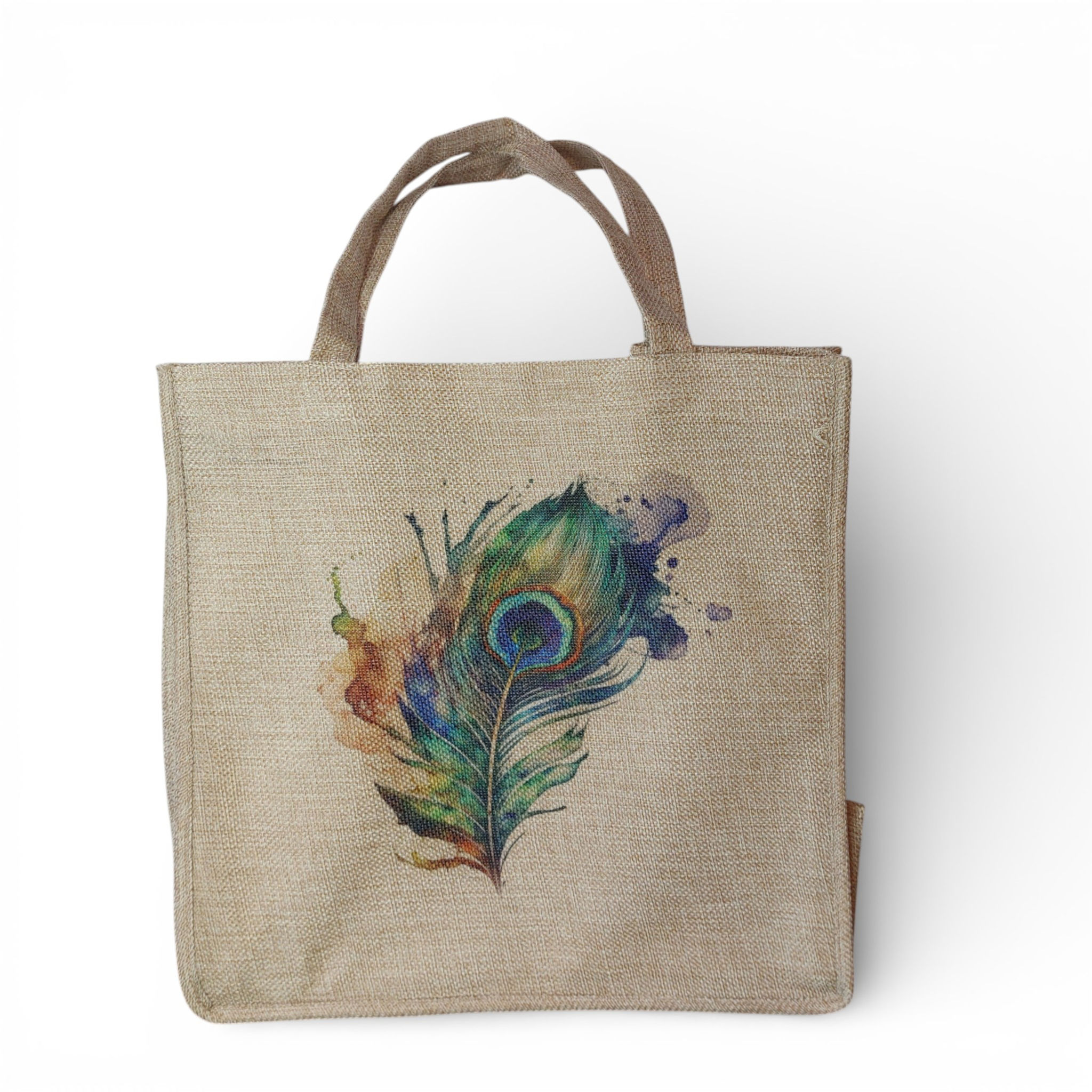 stunning watercolour image of a peacock feather with spalshes and splatters of paint on a burlap bag