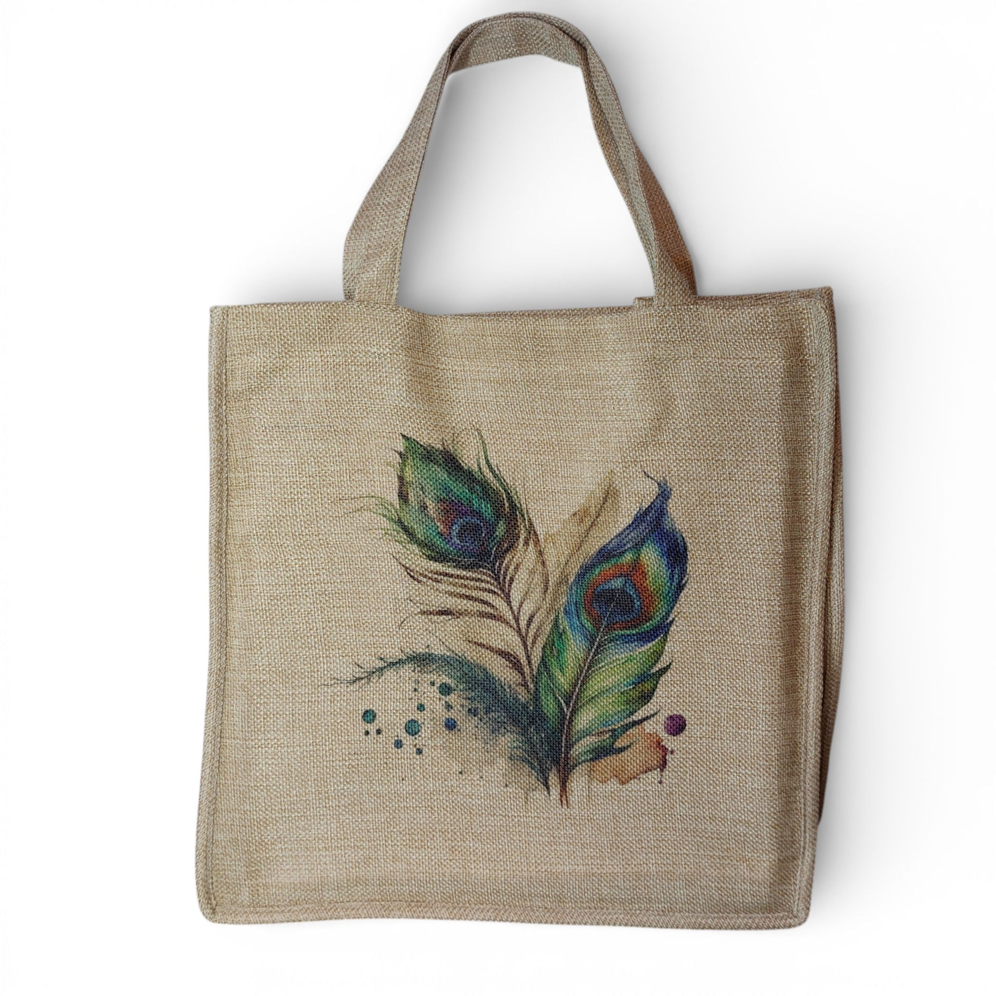 stunning watercolour image of a peacock feather with spalshes and splatters of paint on a burlap bag