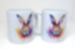 12oz white ceramic mug. Watercolour Hare head in puffs of rainbow watercolour paint splashes and drips