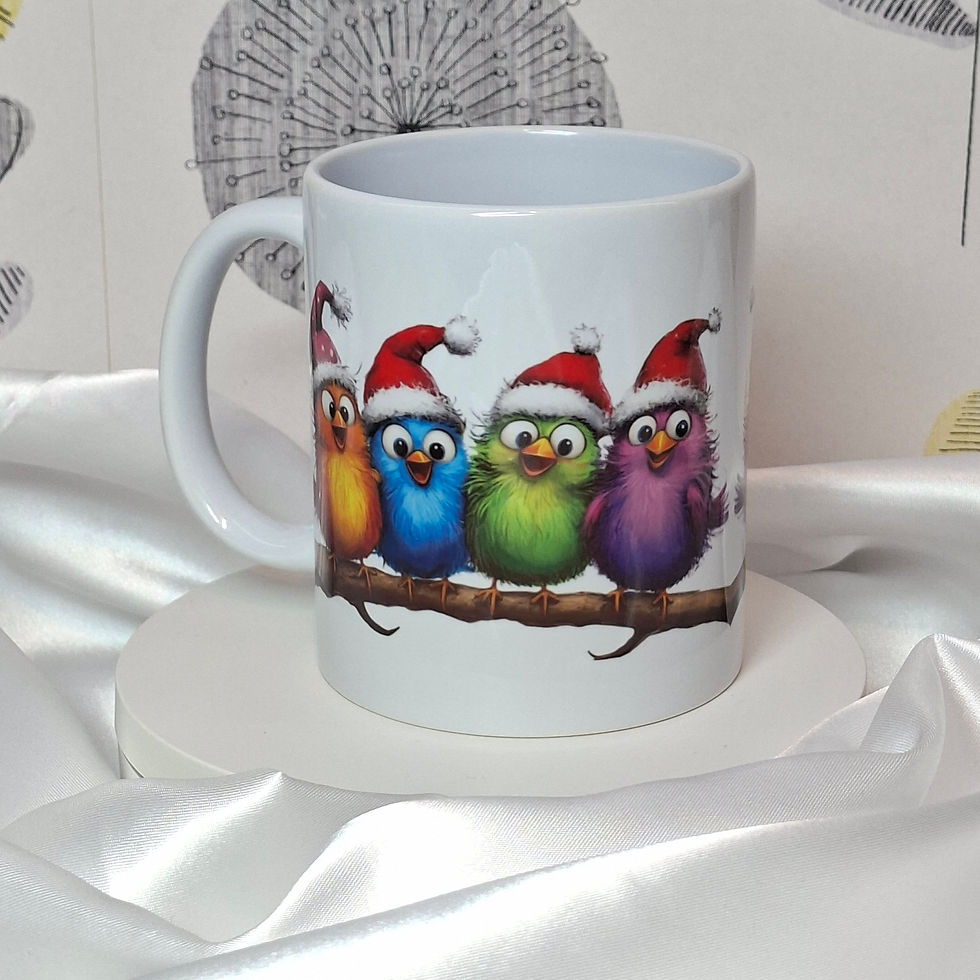 Thumbnail: White ceramic mug with 4 vibrant bright coloured cartoon images of robins wearing santa hats perched on a branch 