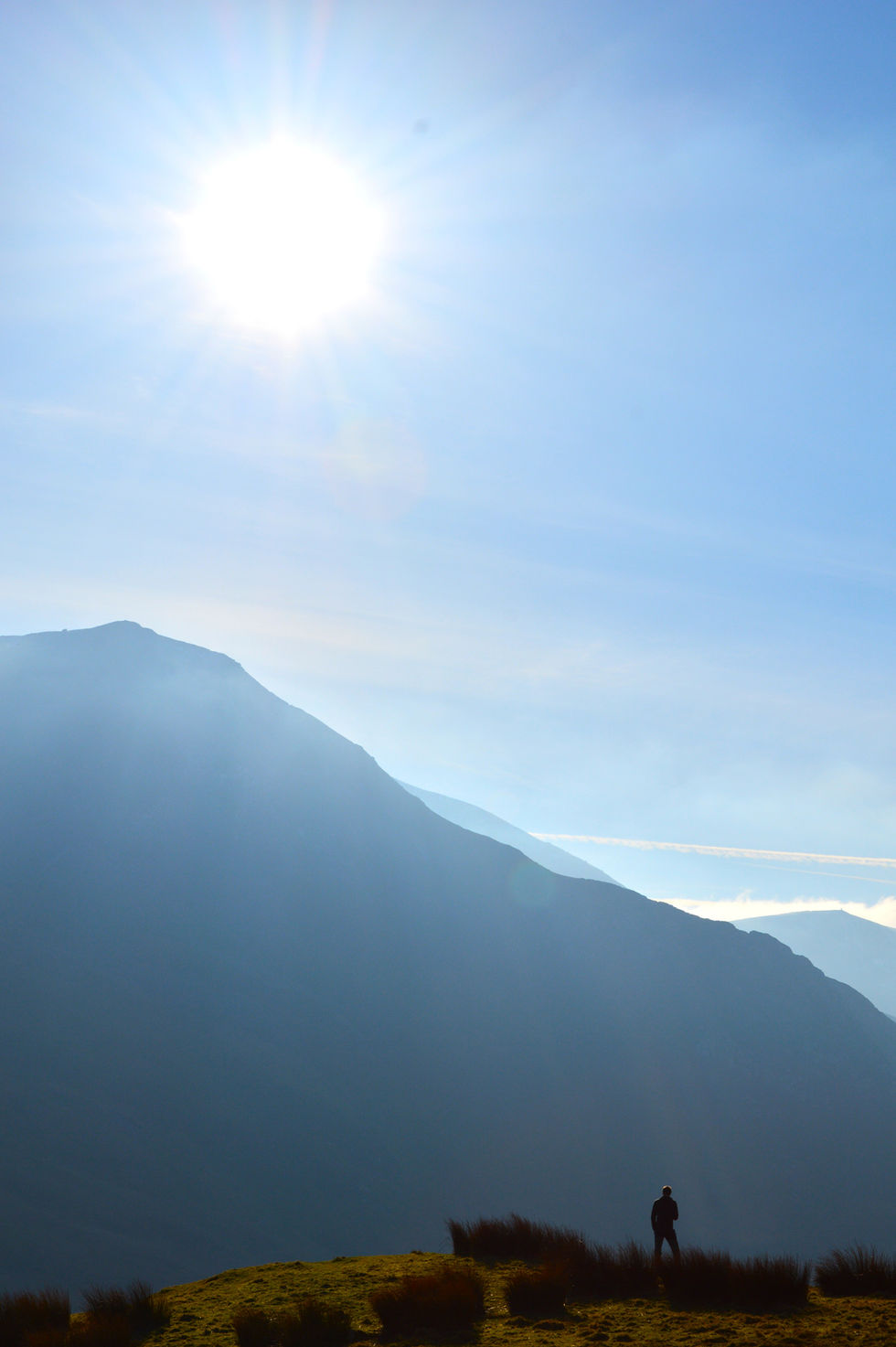 Sunlit mountain ridge above Rhyd Ddu in Eryri National Park
