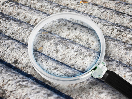 Magnifying glass highlighting detail on an asbestos roof