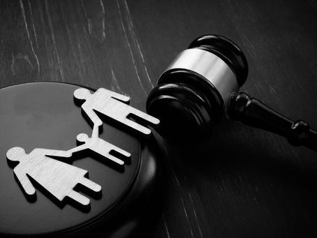 Family law concept with a gavel and family silhouette.