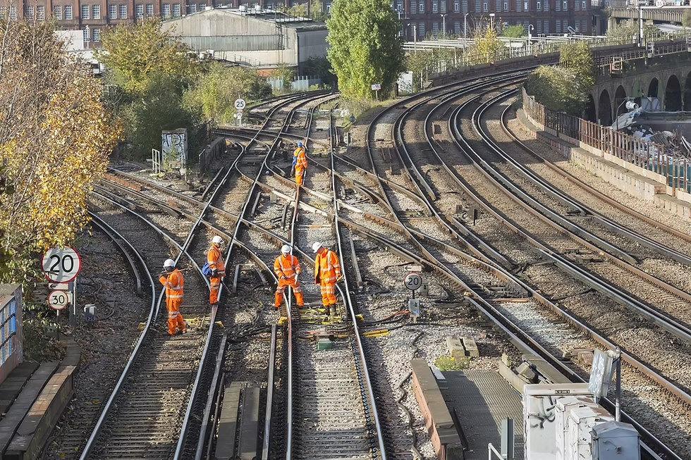 Men working on train tracks