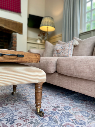Elegant snug with custom furnishings and heritage-inspired décor, designed to harmonise with a stately period home.