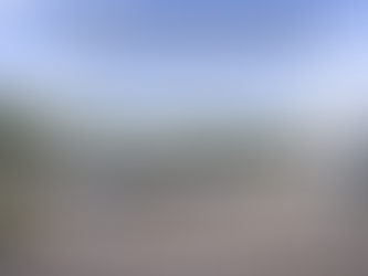 Contractor storage yard in Arvada with trucks, trailers, and equipment stored securely near Wheat Ridge, Golden, and Denver.