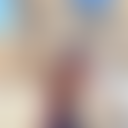 couple in front of the Grandmaster castle in rhodes, greece