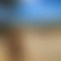 girl walking onto a beach resort