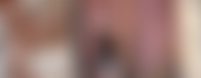 girl in front of metal door