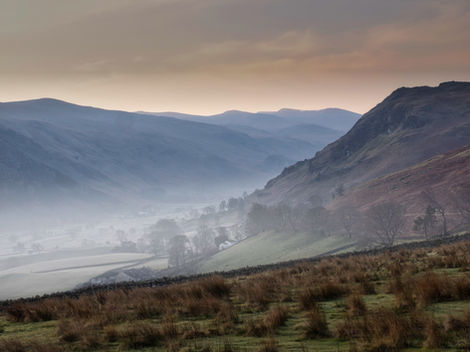 Morning mist over valley behind Tewet Tarn