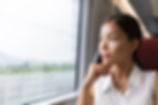 Asian woman traveler contemplating outdo