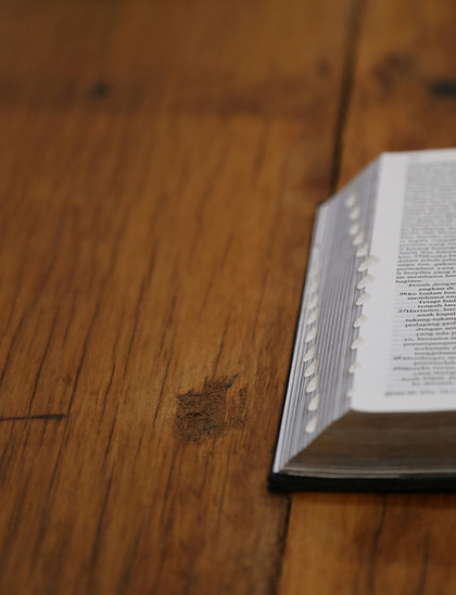 Open Bible lying on a table