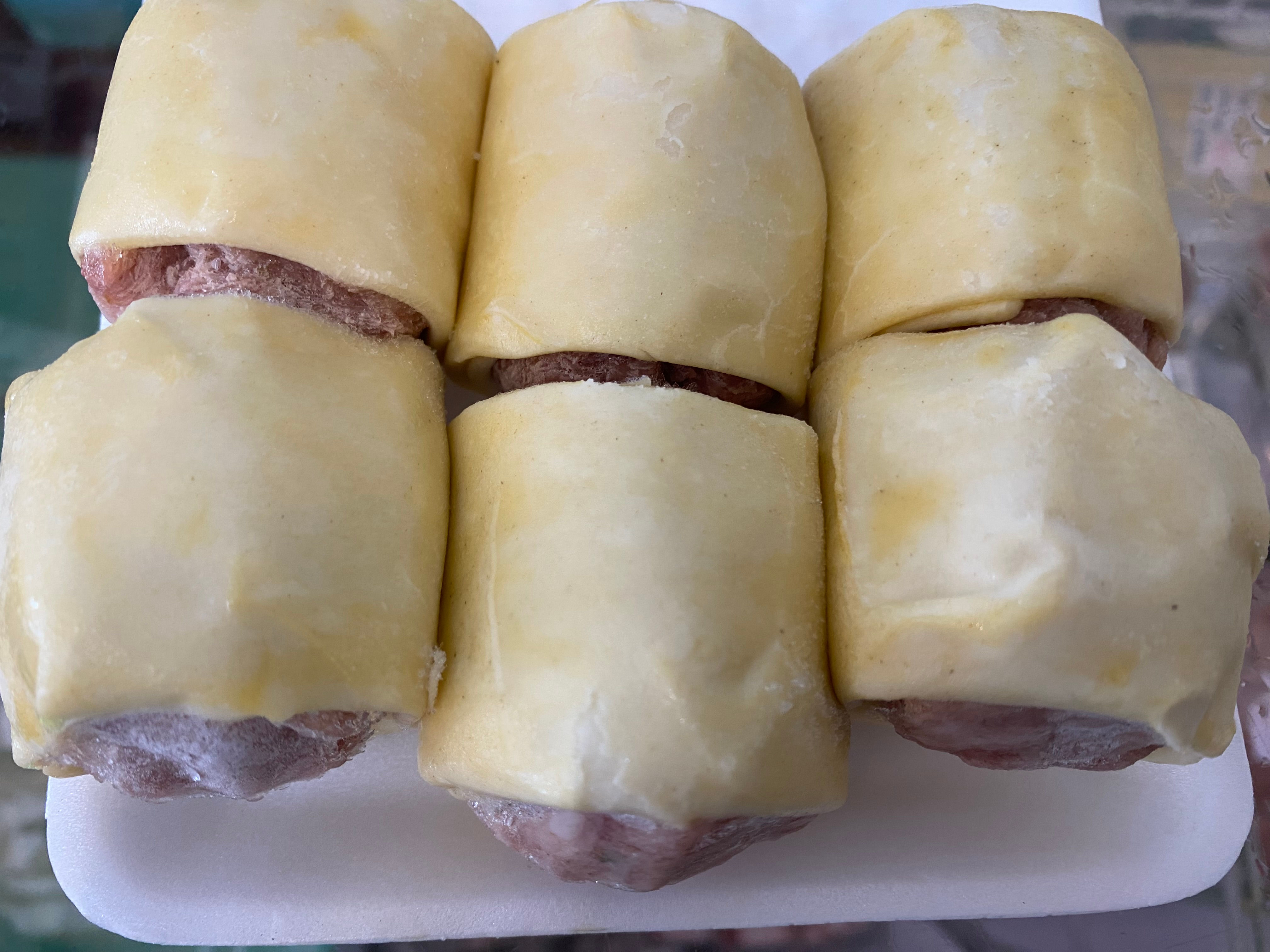 Mini sausage rolls in a 6 pack for 150 baht