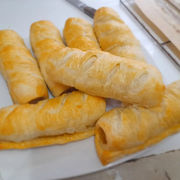 Golden brown sausage rolls at Bamboo Cafe Shop