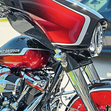 Glossy red, black and silver Harley-Davidson Street Glide CVO after professional paint correction and ceramic coating