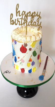 Colorful cake with paint splatters, 