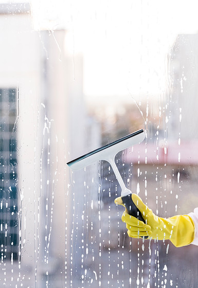Man Cleans Window