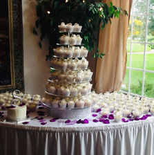 Wedding cupcakes displayed on tiered stand