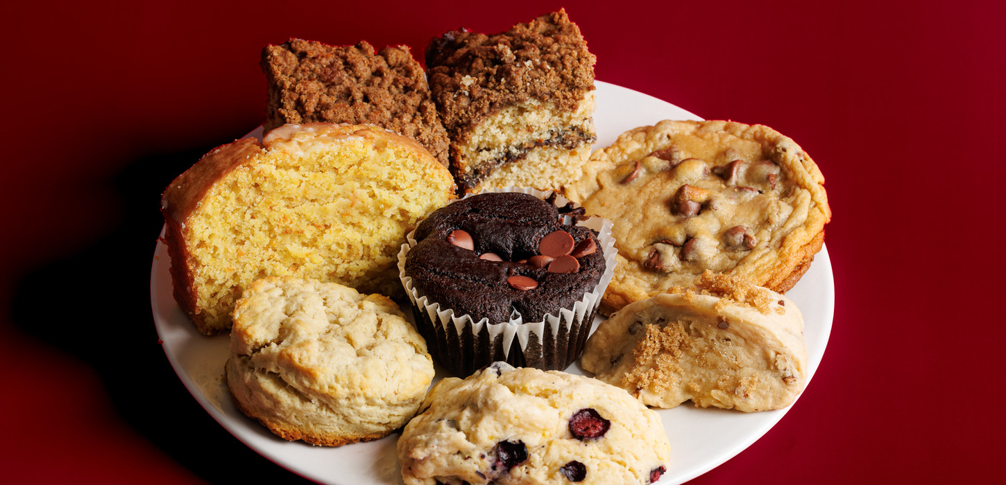 Plate of assorted baked goods including muffins and cookies Enaya's Bakery