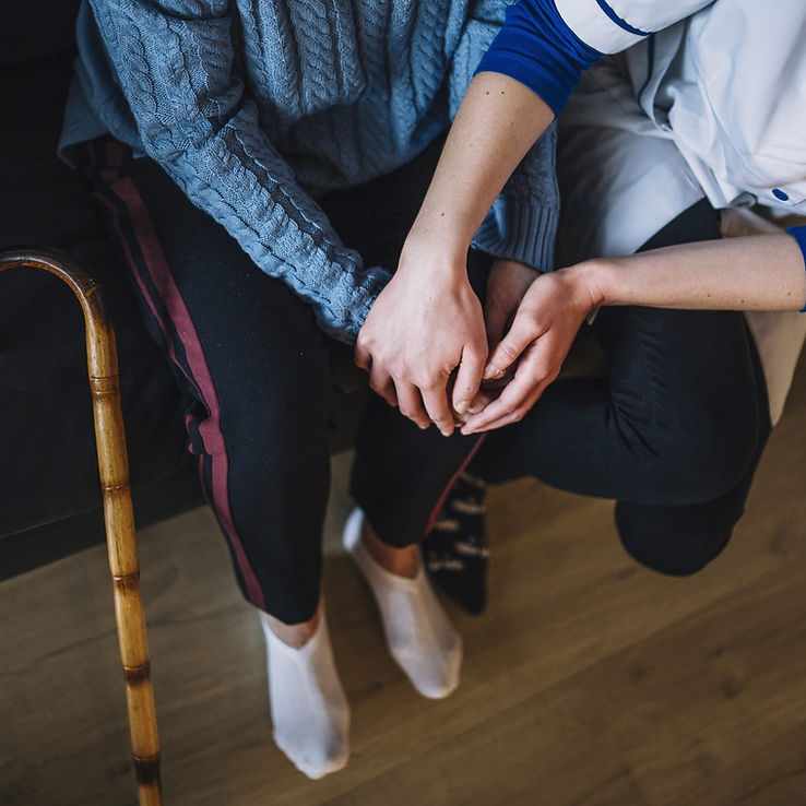 retirement-home-concept-with-nurse-woman-holding-hands-scaled-e1620832968920.jpg
