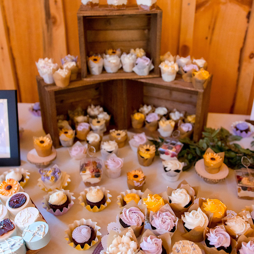 Assorted decorated cupcakes on display