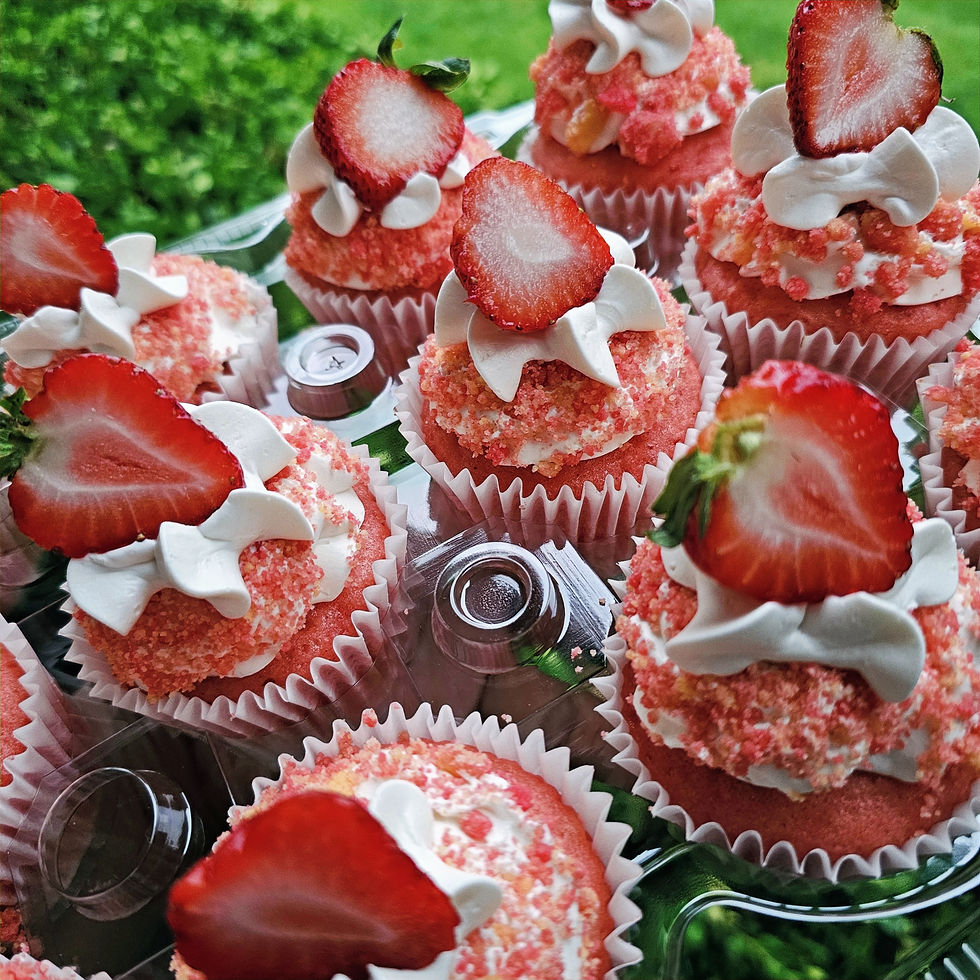 Strawberry cupcakes with cream frosting